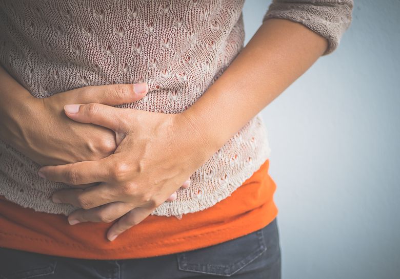 woman-with-stomach-discomfort